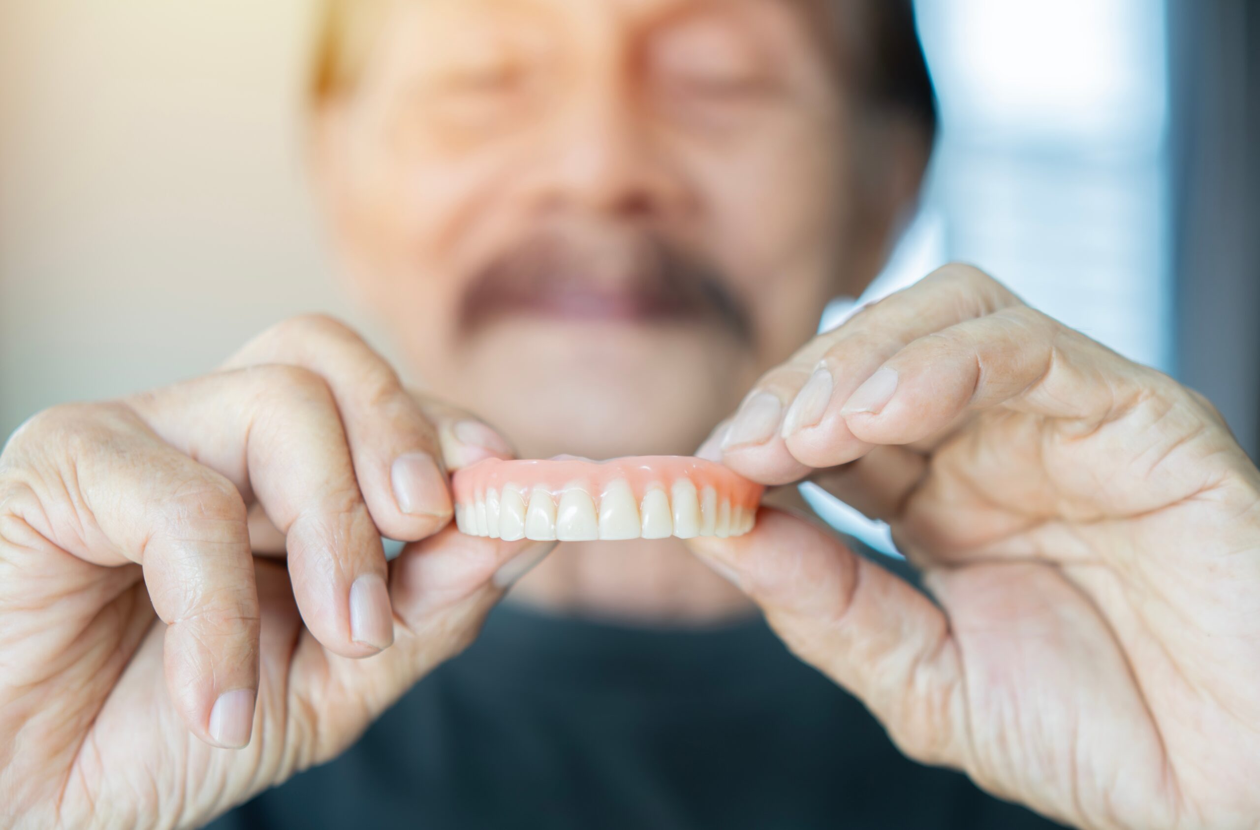 How Dentures From Smileology Can Help Restore Your Confidence