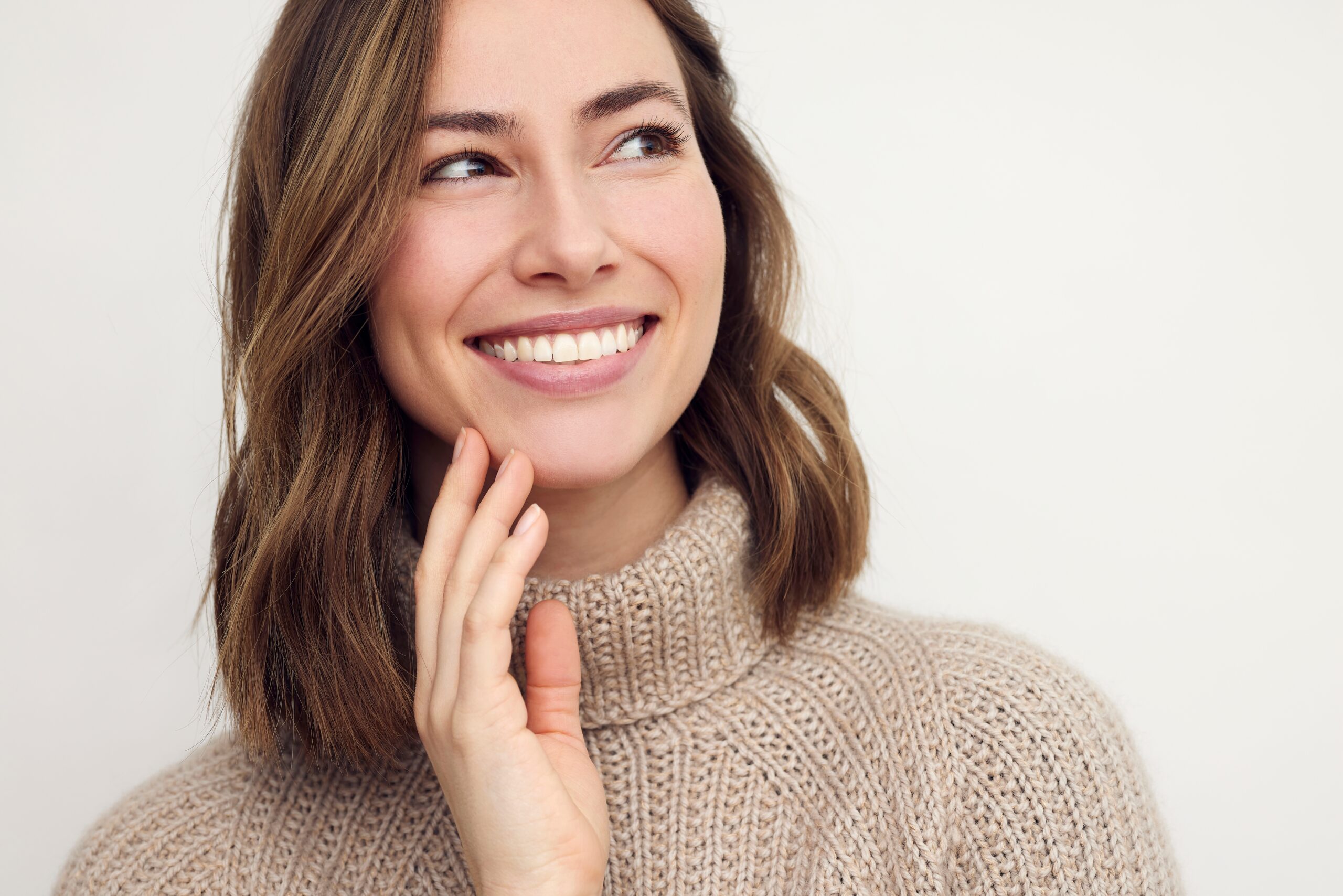 young woman showing off her perfect smile