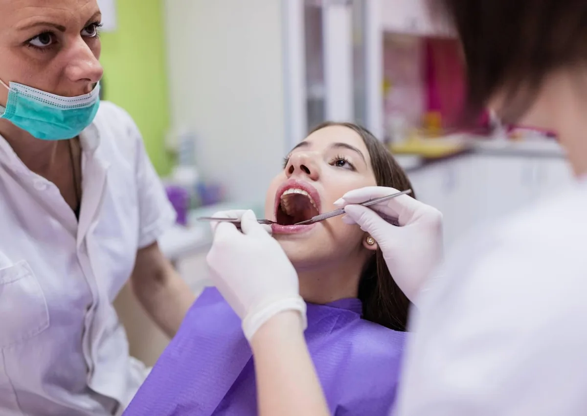Dental examination to determine whether affordable dental implants are a suitable option for replacing missing teeth.